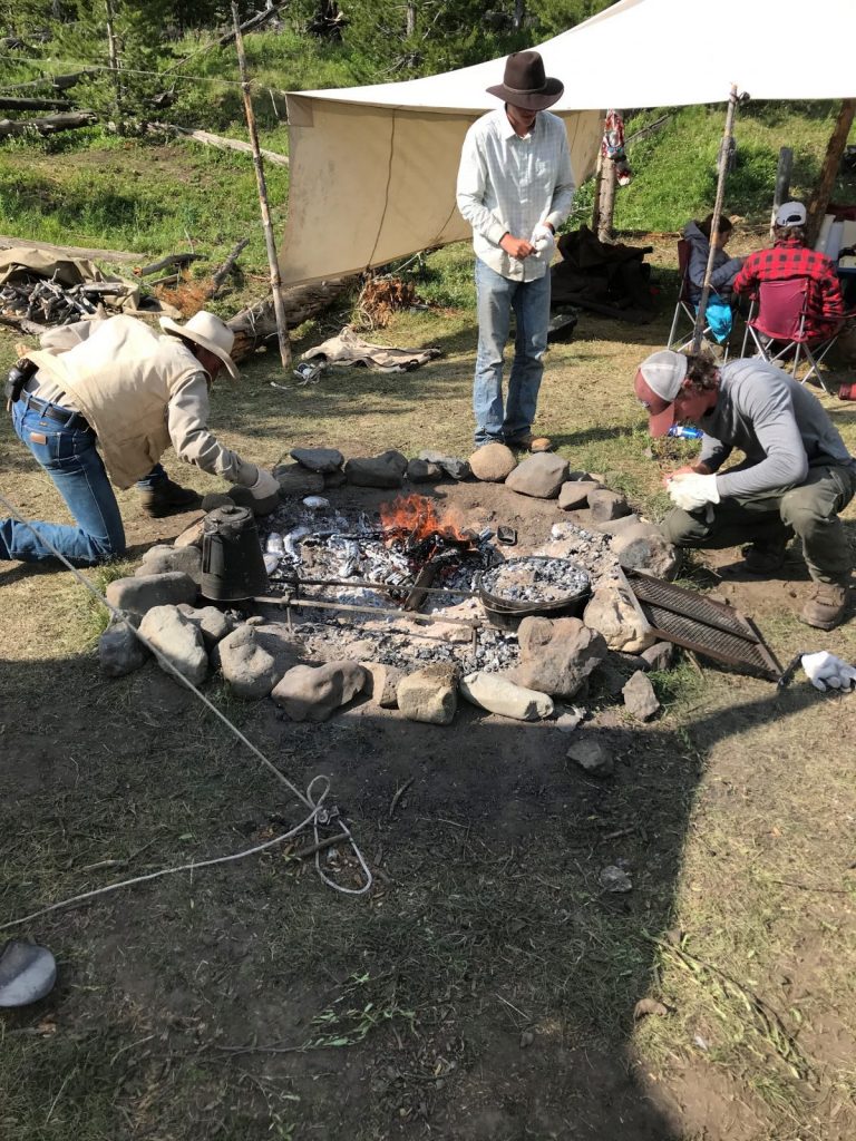 Camp fire cooking Camp Monaco Wyoming Summer Pack Trip with 307 Outfitters of Cody Wyoming